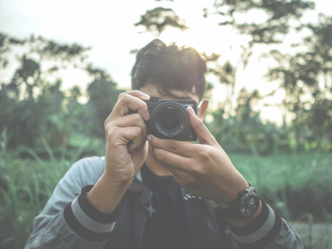 Professional video editing suite with multiple monitors and color grading setup